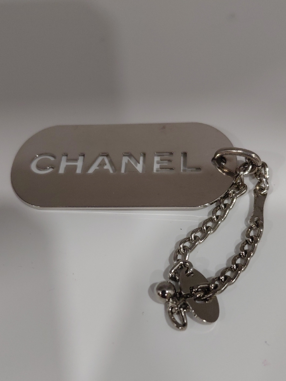 CHANEL Silver-tone Engraved Dog Tag Keychain 2005